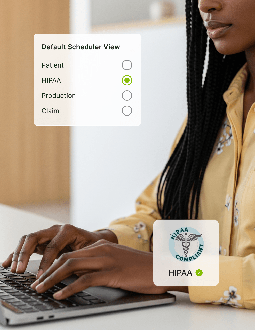 A person types on a laptop. A screen shows options for 'Default Scheduler View' and a 'HIPAA Compliant' badge with a checkmark.