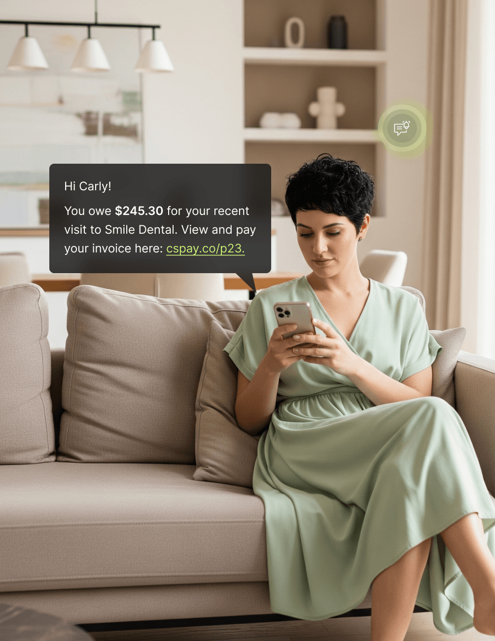 A woman in a green dress sits on a beige sofa, looking at her phone. A notification about a dental bill appears next to her.
