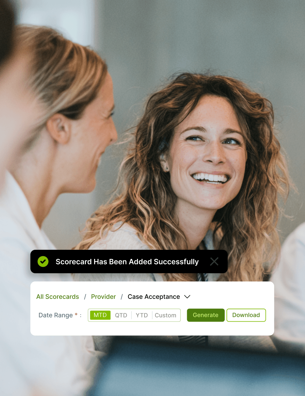 Woman smiling in an office setting with a successful scorecard notification and options for generating reports on screen.
