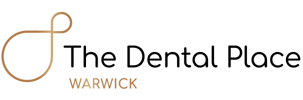 A logo for Warwick Conferences featuring a stylized, golden infinity loop symbol with the word "WARWICK" below and "Warwick Conferences" beside it.